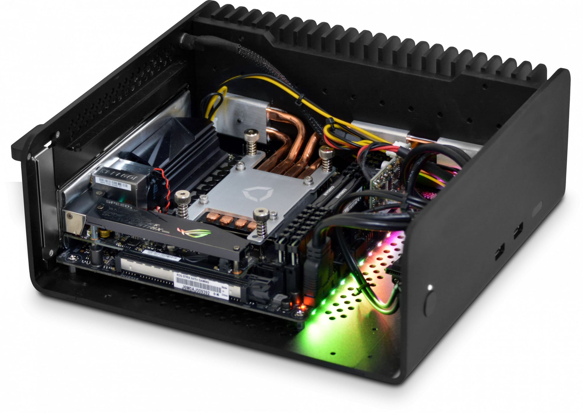 an image of a mini pc that does not have any fans but only heat pipes to dissipate heat