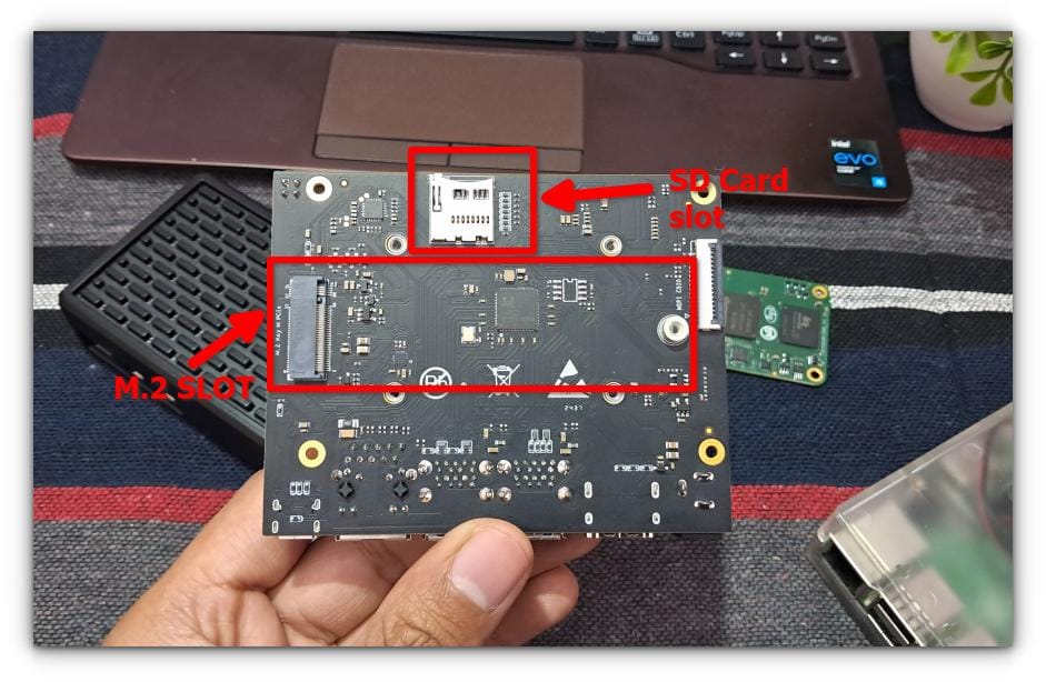 armsom cm5 io board back side view with highlighting m.2 and sd card slot 